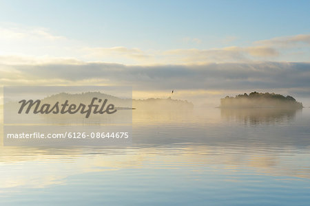 Sweden, Stockholm Archipelago, Uppland, Lidingo, View of sea and islands at dawn