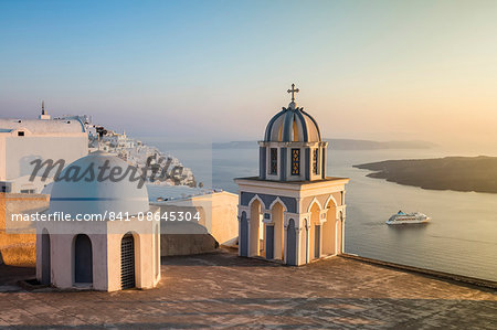 The blue domes of the churches dominate the Aegean Sea, Firostefani, Santorini, Cyclades, Greek Islands, Greece, Europe