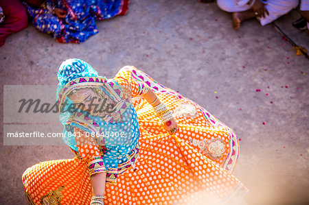 Traditional Radha dance during the Flower Holi Festival, Vrindavan, Uttar Pradesh, India, Asia