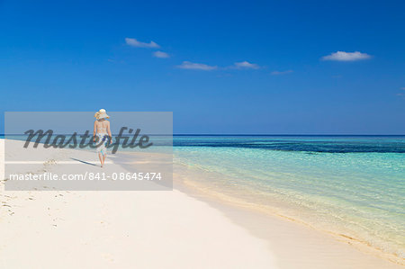 Woman on beach, Rasdhoo Island, Northern Ari Atoll, Maldives, Indian Ocean, Asia