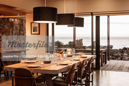 Home showcase dining room overlooking ocean