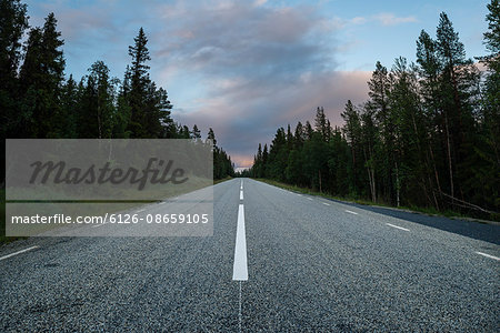 Sweden, Harjedalen, Ljungdalen, Road at dusk