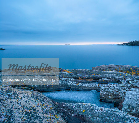 Sweden, Stockholm archipelago, Sodermanland, Femore, Eroded rock formations on coastline