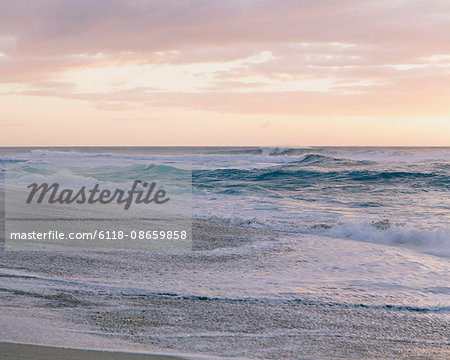 Waves and surf at dusk