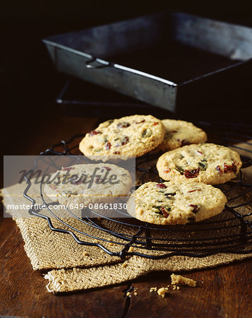 Pistachio and cranberry oat cookies, vintage props, wooden table