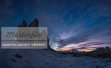 Night landscape with silhouette of Tre Cime mountain, Dolomites Italy