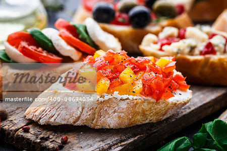 Italian bruschetta with chopped tomatoes, herbs and oil on toasted crusty ciabatta bread