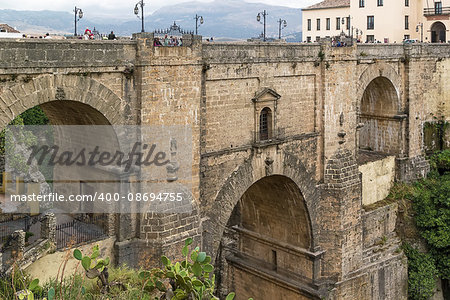 The Puente Nuevo (New Bridge) is largest bridges that span the 120-metre deep chasm that divides the city of Ronda, Spain. In was build in 1793