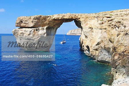The Azure Window in Malta - a huge natural arch in the sea cliffs.