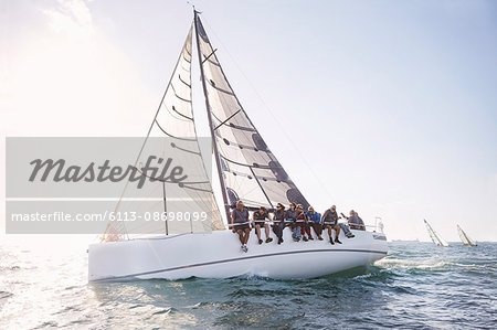 Friends sailing on sunny ocean Friends sailing on sunny ocean