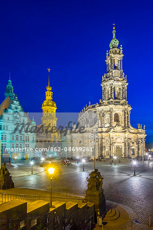 Germany, Saxony, Dresden, Altstadt (Old Town). Dresden Cathedral (Cathedral of the Holy Trinity), Hausmannsturm tower and Georgenbau on the Schlossplatz at night.