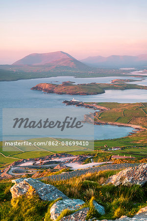 Valentia island (Oilean Dairbhre), County Kerry, Munster province, Ireland, Europe. View from the Geokaun mountain and Fogher cliffs at sunset. Valentia island (Oilean Dairbhre), County Kerry, Munster province, Ireland, Europe. View from the Geokaun mountain and Fogher cliffs at sunset.