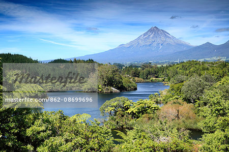 New Zealand. Taranaki. Lake Mangamahoe and the volcano Mount Taranaki aka Mt Egmont.