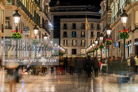 Night view of Calle Marques de Larios pedestrian street, Malaga, Andalusia, Spain