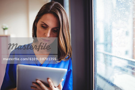 Nurse using digital tablet in the hospital
