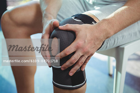 Close-up of man with knee injury in the clinic