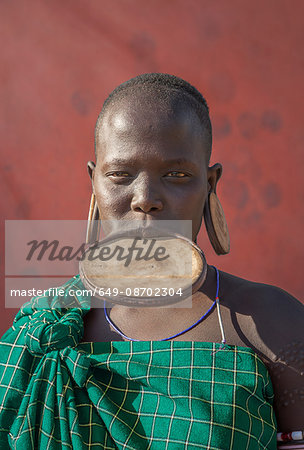 Woman of the Mursi Tribe with disc in her lower lip, Omo Valley, Ethiopia
