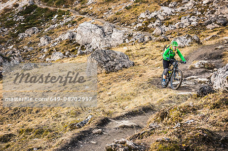 Cyclist on mountain biking area, Kleinwalsertal, trails below Walser Hammerspitze, Austria