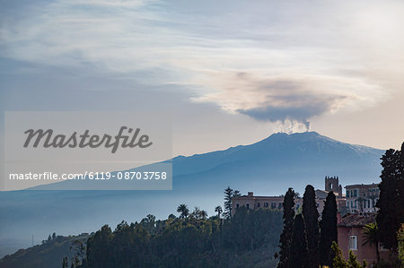 The awe inspiring Mount Etna, UNESCO World Heritage Site and Europe's tallest active volcano, seen from Taormina, Sicily, Italy, Mediterranean, Europe