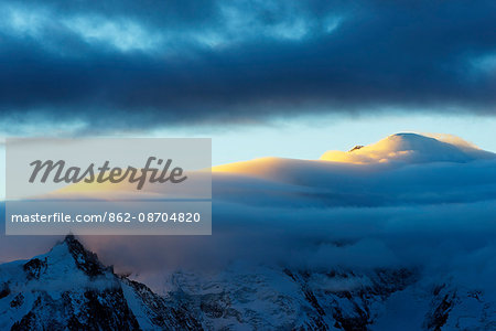 Europe, France, Haute Savoie, Rhone Alps, Chamonix, Mont Blanc under clouds