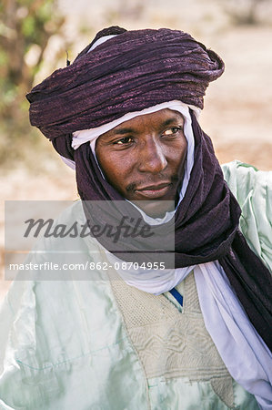 Niger, Agadez, Inebeizguine. A Wodaabe man wearing an indigo-blue turban.