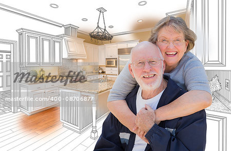 Happy Senior Couple Over Custom Kitchen Design Drawing and Photo Combination.