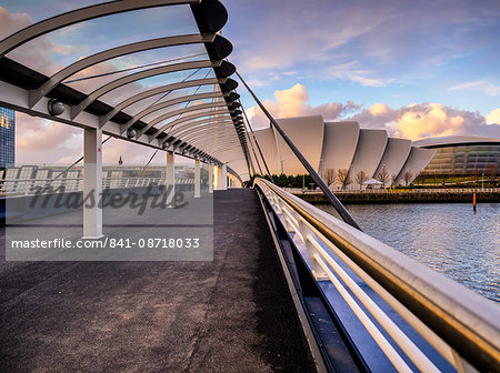 A stunning sunset over Bells Bridge, Glasgow, Scotland, United Kingdom, Europe