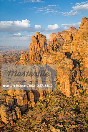 Ethiopia, Tigray Region, Gheralta Mountains.  The ruggedly beautiful red sandstone mountains of the Gheralta region of northern Tigray is where many important ancient rock-hewn churches are situated.