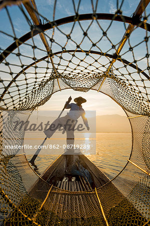 Inle lake, Nyaungshwe township, Taunggyi district, Myanmar (Burma). Local fisherman with typical conic fishing net.