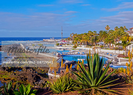 Spain, Canary Islands, Tenerife, Puerto de la Cruz, View of the Martianez Pools designed by Cesar Manrique.