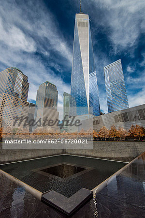 Southern Pool of National September 11 Memorial & Museum with One World Trade Center or Freedom Tower behind, Lower Manhattan, New York, USA