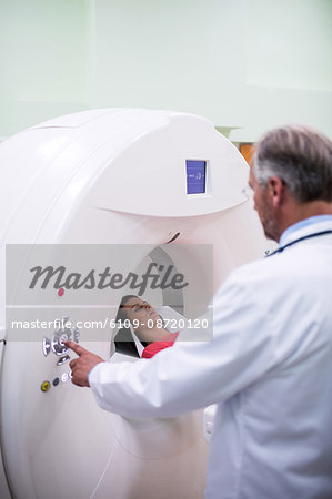 Patient entering mri scan machine at hospital