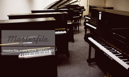 Pianos arranged in workshop