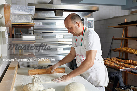 Baker working in bakery