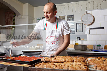 Baker working in bakery