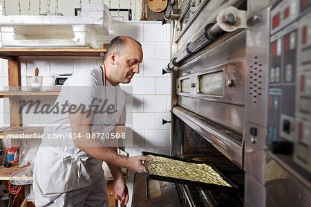 Baker working in bakery