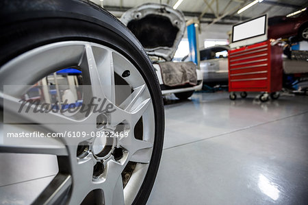 Close-up of car wheel at the repair garage