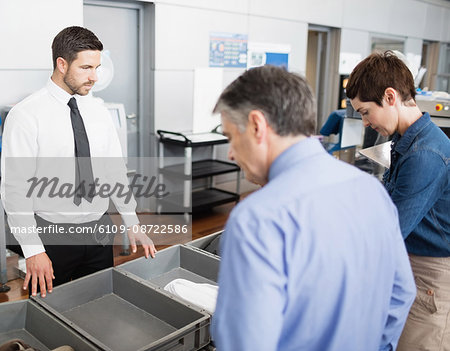 Passengers in security check at airport