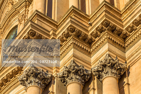 Detail of the ornate mouldings and capitals of pillars of the Cathedral of Saint George (Duomo di San Giorgio) in Ragusa in Sicily, Italy