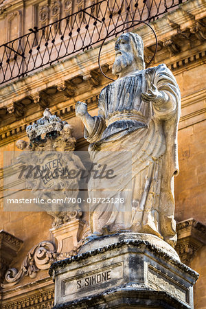 Close-up of a statue of Saint Simon on the steps of St Peter's Cathedral (Duomo di San Pietro) in Modica in the Province of Ragusa in Sicily, Italy