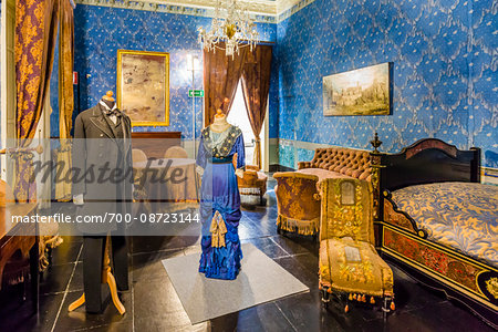 Bedroom interior with mannequins dressed in historic clothing at Donnafugata Castle in Ragusa in the Province of Ragusa in Sicily, Italy Bedroom interior with mannequins dressed in historic clothing at Donnafugata Castle in Ragusa in the Province of Ragusa in Sicily, Italy