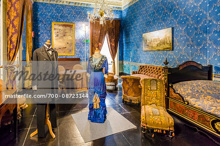 Bedroom interior with mannequins dressed in historic clothing at Donnafugata Castle in Ragusa in the Province of Ragusa in Sicily, Italy