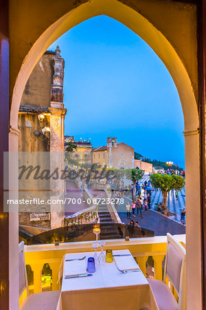 View from Wunderbar Caffe to Piazza IX Aprile with Steps of San Giuseppe Church and St Augustine's Church in the background, Taormina, Sicily, Italy