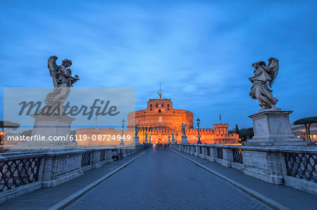 Dusk on the ancient palace of Castel Sant'Angelo with statues of angels on the bridge on Tiber RIver, UNESCO World Heritage Site, Rome, Lazio, Italy, Europe