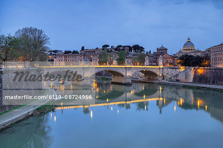 Dusk on Tiber River with Umberto I Bridge and the Basilica di San Pietro in the Vatican in the background, Rome, Lazio, Italy, Europe