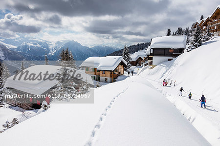 Tourists and skiers enjoying the snowy landscape, Bettmeralp, district of Raron, canton of Valais, Switzerland, Europe
