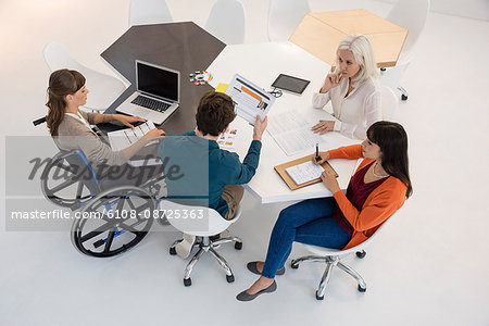 Business people discussing in an office Business people discussing in an office