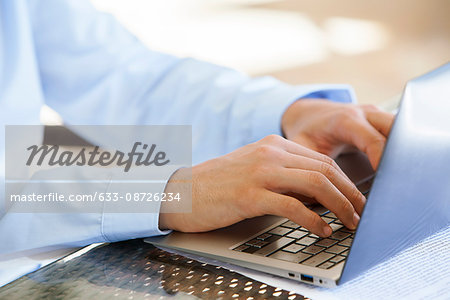 Businessman using laptop computer