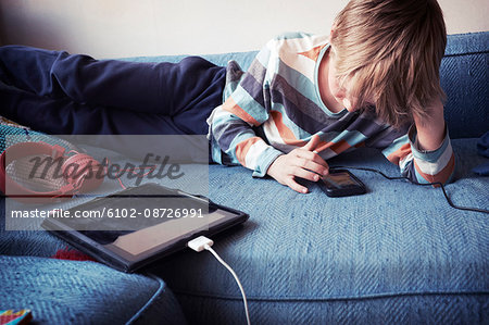 Boy using cell phone
