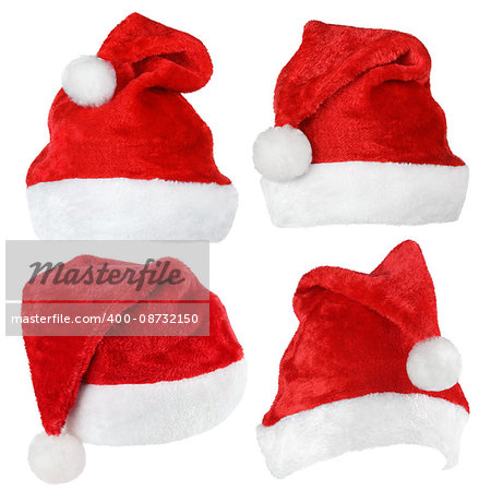 Set of red Santa Claus hats isolated on white background